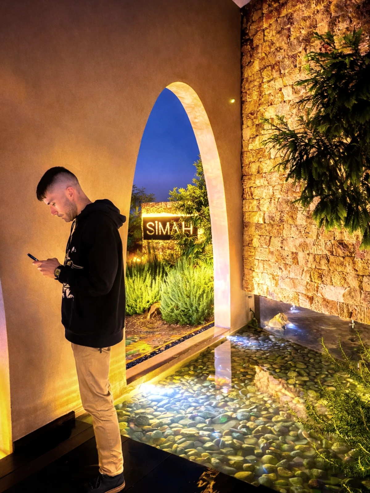 Erik Deci in an illuminated architectural setting